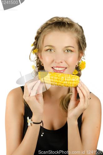 Image of woman eating corn-cob