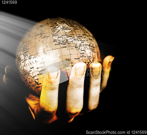 Image of Globe in a girl's hands