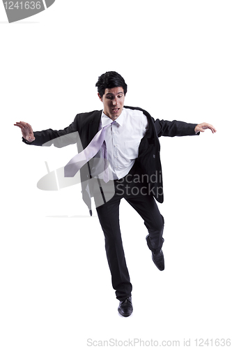 Image of Businessman almost falling