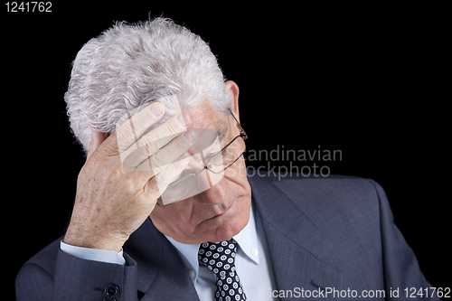 Image of Headache on a senior businessman