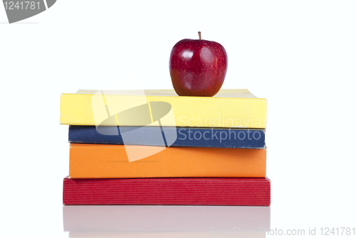Image of Books and a fresh apple