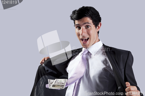 Image of Businessman with a flying necktie with money