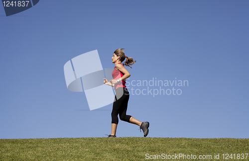 Image of Running at the top of the hill