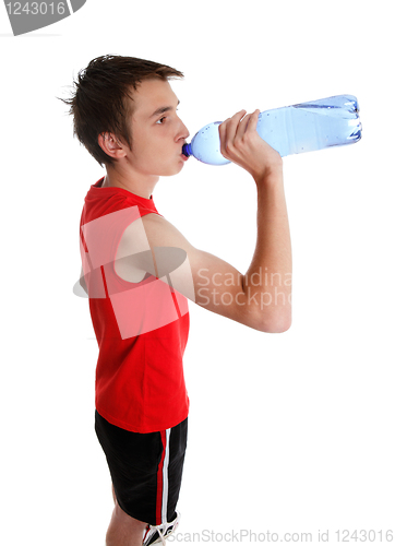 Image of Teenager drinking bottled water