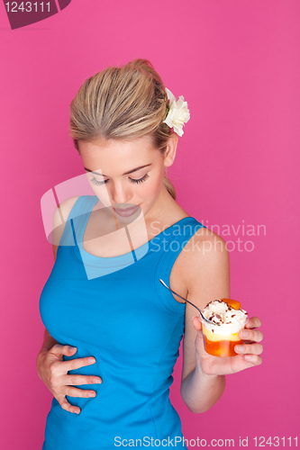 Image of woman eating pudding