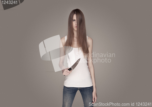 Image of long haired woman