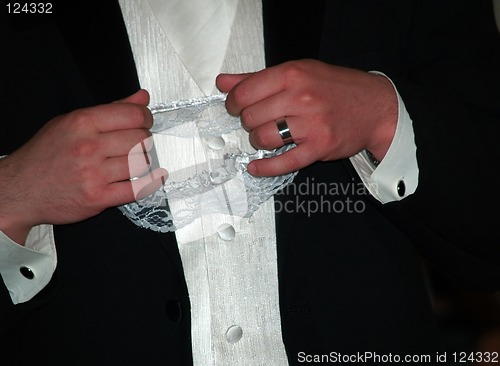 Image of wedding - groom with garter