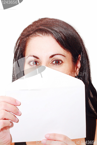 Image of woman covering her face with a letter isolated 