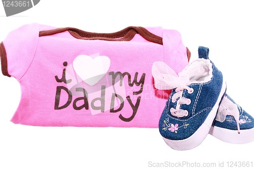 Image of Baby shoes and suits with a message for the fathers day