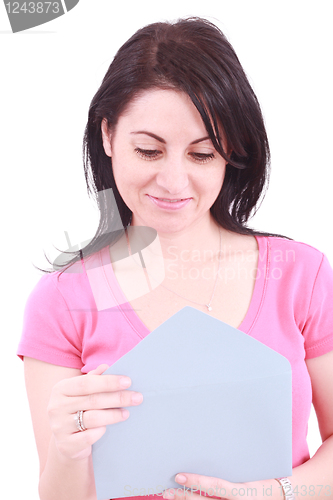 Image of Young beautiful woman opening a letter isolated on a white background