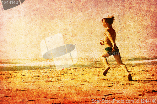Image of Child running on a beach