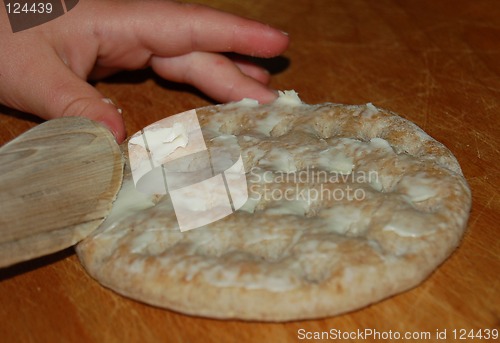 Image of Kid making sandwich