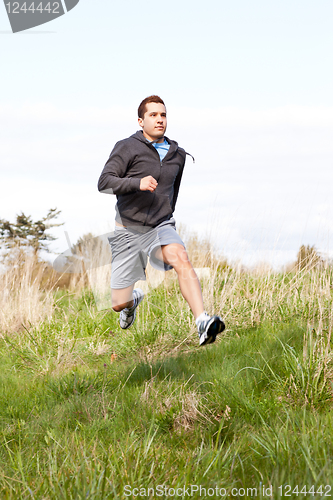 Image of Mixed race man running