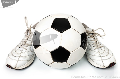 Image of Pair of sneakers and soccer ball