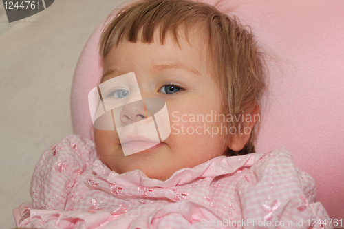 Image of girl lies on a pillow