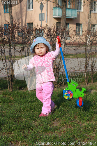 Image of little girl play on walk