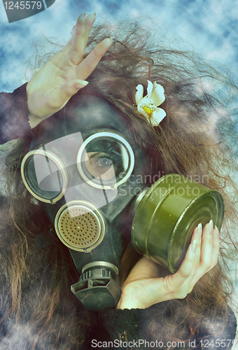 Image of girl in a gas-mask             