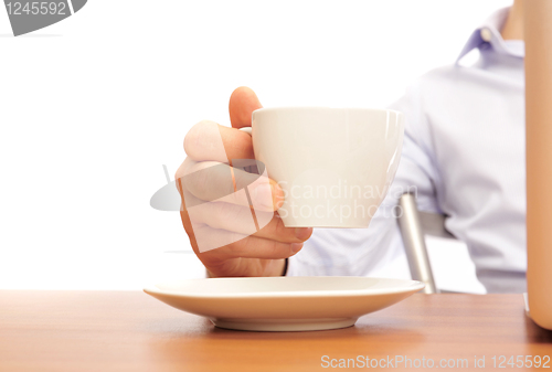 Image of businessman with a cup of tea 