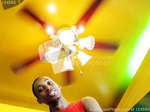 Image of Man under a spinning light