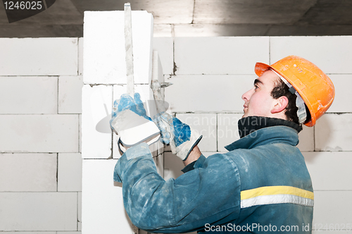 Image of construction mason worker bricklayer