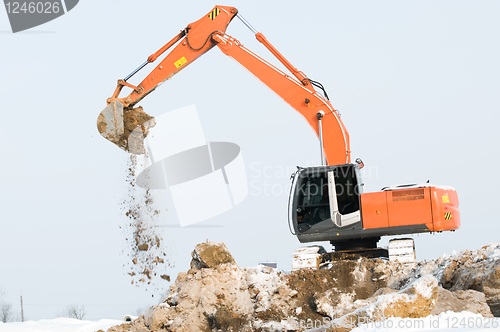 Image of excavator loader at winter works