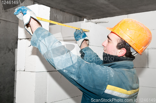 Image of construction mason worker bricklayer