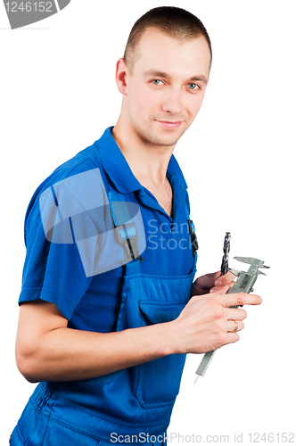 Image of worker with caliper