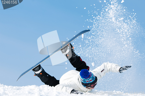 Image of snowboard extreme falling