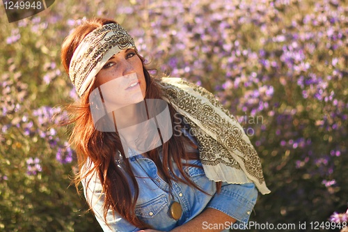 Image of Beautiful Woman on a Field in Summertime 
