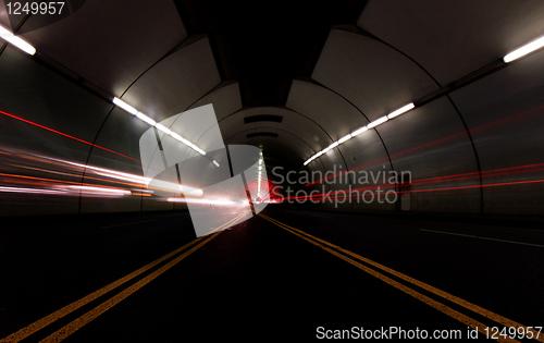 Image of Vehicles Passing Fast in a Tunnel Leaving Light Streaks