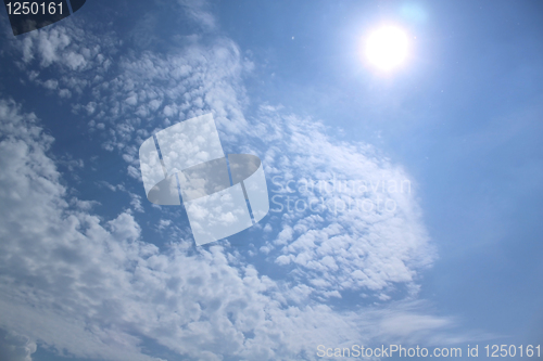 Image of Fluffy clouds in the blue sky