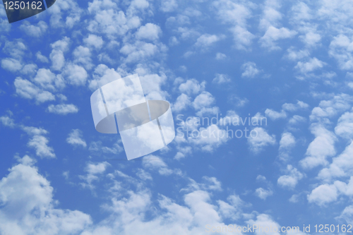 Image of Fluffy clouds in the blue sky