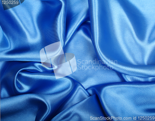 Image of Smooth elegant blue silk can use as background 