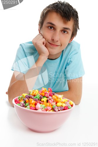 Image of Smiling boy with bowl of popcorn