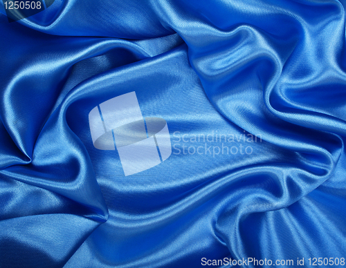 Image of Smooth elegant blue silk as background 