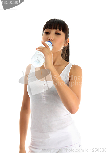 Image of Fitness girl drinking water