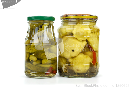 Image of Glass jars with cornichons and cymblings