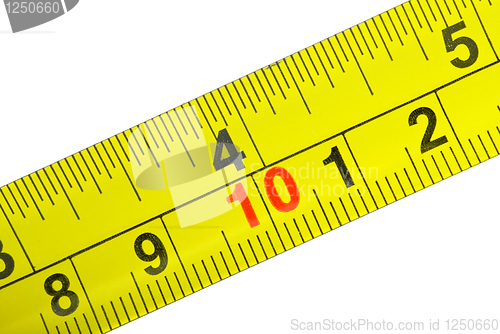 Image of Close-up shot of yellow metal measurement tape