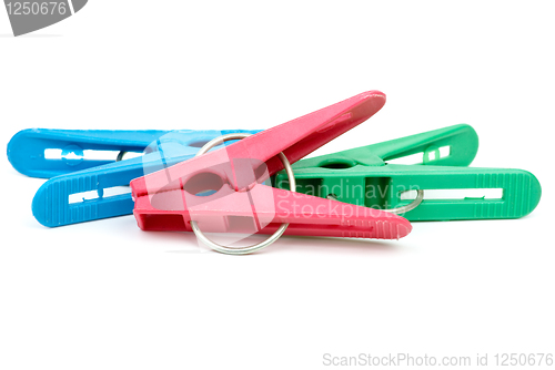 Image of Three cheap plastic clotespins