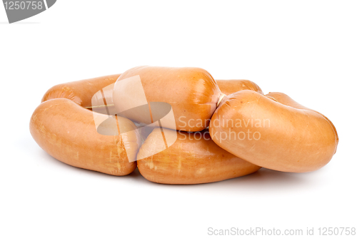 Image of Pile of sausages isolated on the white background