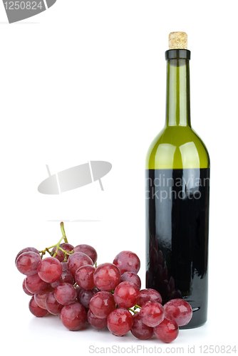 Image of Wine bottle and grapes isolated on the white background