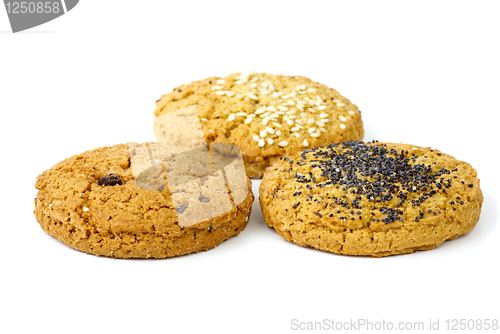 Image of Three oatmeal cookies isolated on the white background