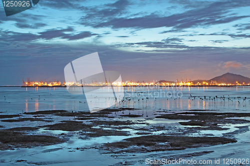 Image of Sunset in Hong Kong along the coast at dusk 