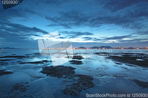 Image of Sunset in Hong Kong along the coast at dusk 