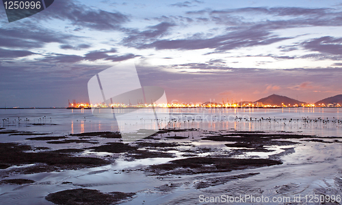 Image of Sunset in Hong Kong along the coast at dusk 