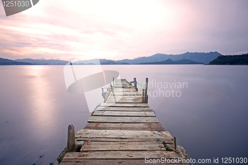 Image of old jetty walkway pier the the lake 