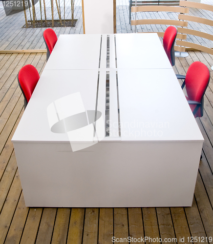 Image of office desks and red chairs cubicle set 