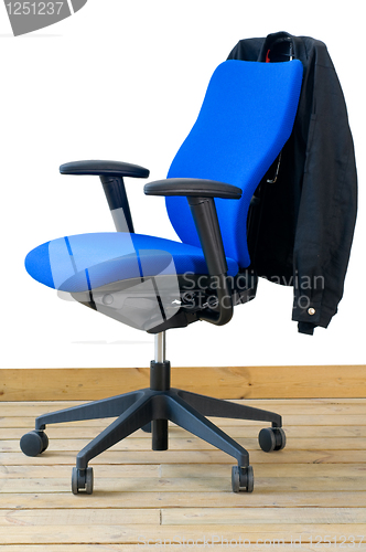 Image of modern blue office chair with jacket on back