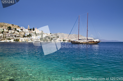 Image of Colorful houses and sailing boat 