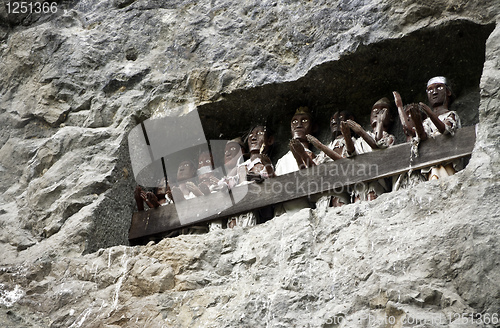 Image of  Tau tau on balconies the Toraja way of death